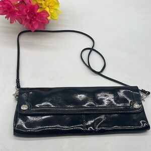 Franco Sarto Black Patent Ling Skinny East west clutch with strap. BP4523B